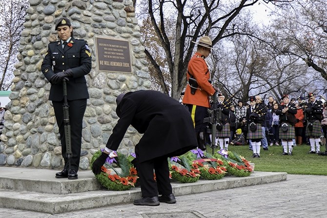 Organizations and individuals laid wreaths on the Cenotaph to commemorate Veterans. Many would pause for a moment afterwards to offer a salute or a prayer. 