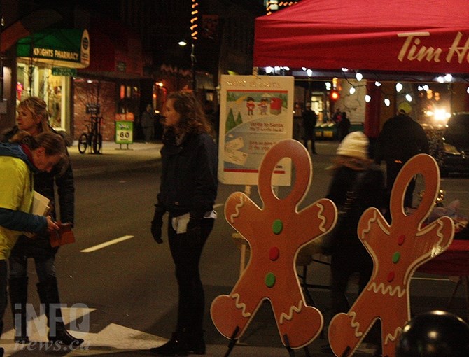 Volunteers set up one of the night's most popular attractions, letters to Santa at last night's Main Street light up event in Penticton, Nov. 22, 2018.
