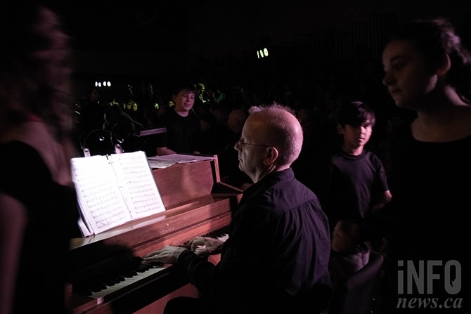 Playing piano is Wilf Froese, who performs with the principal of the school Sydney Griffith. 
