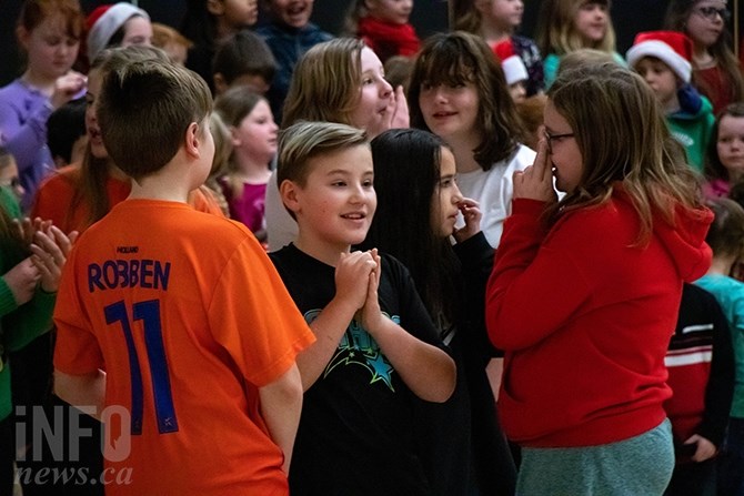 Lucas Woods, age 11, is the son of Carmelina Woods. He is part of Pod 3, which includes grades five to seven. Jennica Alpaugh, his choir director, says, 