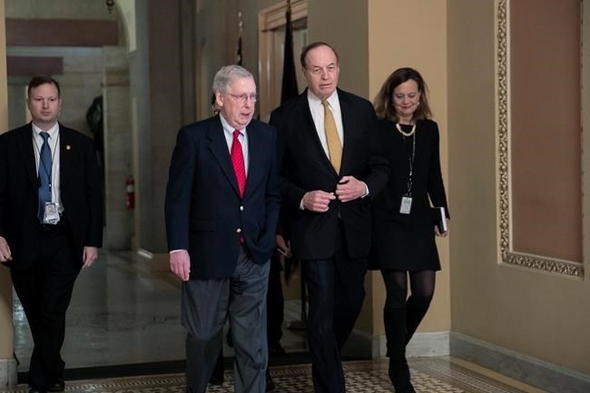 En route to a meeting at the White House, Senate Majority Leader Mitch McConnell, R-Ky., left, walks with Sen. Richard C. Shelby, R-Ala., chairman of the Senate Appropriations Committee, as work continues prior to a Friday night funding deadline to avoid a partial government shutdown, in Washington, Friday, Dec. 21, 2018.