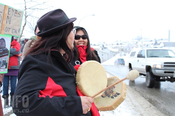 Protestors with the Tiny House Warriors drumming and singing outside the Coast Kamloops Hotel on Wednesday, Jan. 9, 2019. 