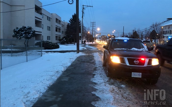 Police stationed outside an apartment in the Kamloops neighbourhood of Brocklehurst on Feb. 15, 2019.