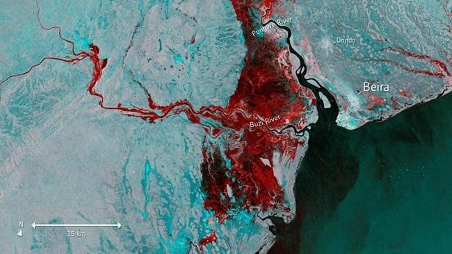 This Tuesday, March 19, 2019 photo taken from Copernicus Sentinel-1 and provided by the European Space Agency, ESA, shows the extent of flooding, depicted in red, around the port town of Beira in Mozambique. following cyclone force winds and heavy rain near the coastal city.