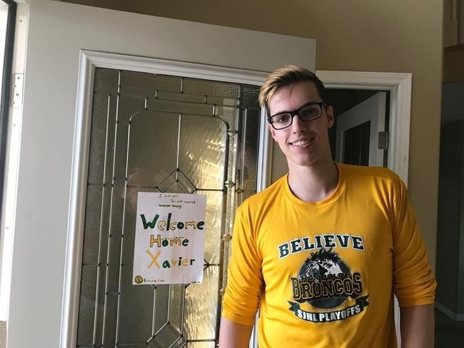 Humboldt Broncos hockey player Xavier LaBelle is shown in a handout photo after being released from hospital. The 13 survivors of the Humboldt Broncos bus crash are still dealing with injuries ranging from paralysis and back pain to brain damage and mental health issues.