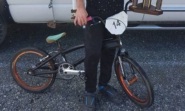 The second bike stolen is a Black PURE frame with 20 inch wheels and orange accents with pink coloured handlebar grips.