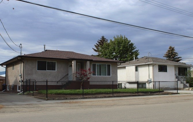 These two North End houses were build in 2006 (left) and 1958.