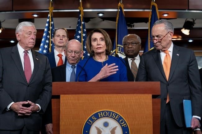 Speaker of the House Nancy Pelosi, D-Calif., center, Senate Minority Leader Chuck Schumer, D-N.Y., right, and other congressional leaders, react to a failed meeting with President Donald Trump at the White House on infrastructure, at the Capitol in Washington, Wednesday, May 22, 2019. From left are House Majority Leader Steny Hoyer, D-Md., Sen. Ron Wyden, D-Ore., House Transportation and Infrastructure Committee Chair Peter DeFazio, D-Ore., Pelosi, House Majority Whip James E. Clyburn, D-S.C., and Schumer.