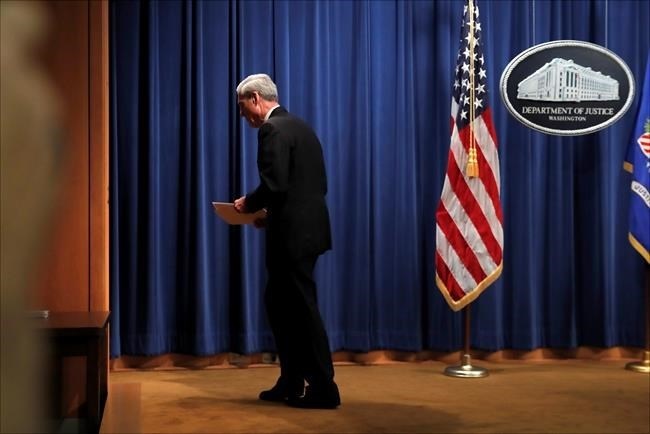 Special counsel Robert Muller leaves the podium after speaking at the Department of Justice Wednesday, May 29, 2019, in Washington, about the Russia investigation.