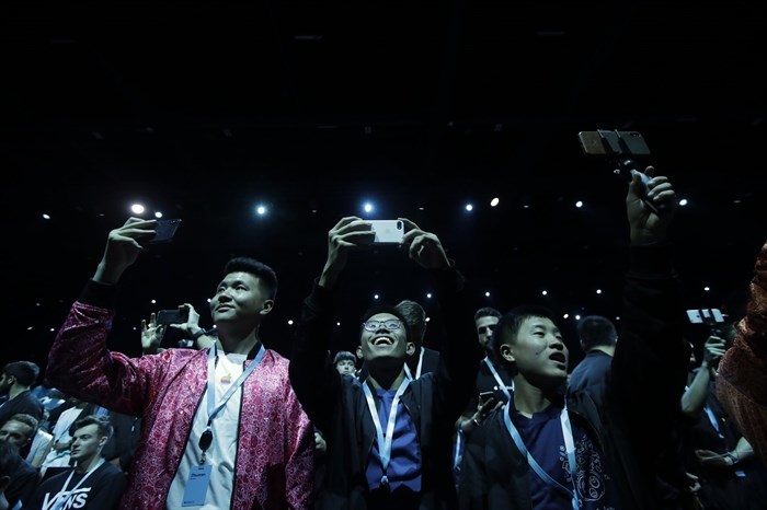 Attendees await the start of the keynote address at the Apple Worldwide Developers Conference in San Jose, Calif., Monday, June 3, 2019.