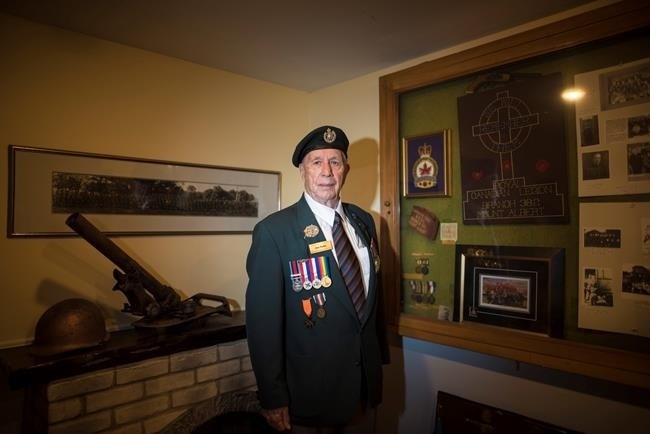 D-Day veteran Jim Parks, 94, poses for a photograph at the Mount Albert Legion in Newmarket, Ont., on Thursday, May 30, 2019.