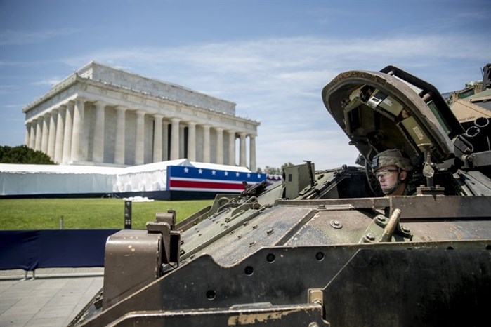One of two Bradley Fighting Vehicles waits to be driven into place in front of the Lincoln Memorial for President Donald Trump's 'Salute to America' event honoring service branches on Independence Day, Tuesday, July 2, 2019, in Washington. President Donald Trump is promising military tanks along with 