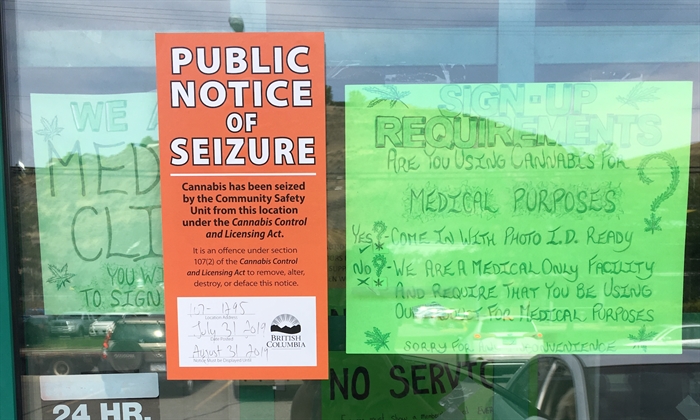FILE PHOTO - Boomer's Bud in Kamloops displayed a sign notifying the public cannabis products had been seized from the location on July 31, 2019.