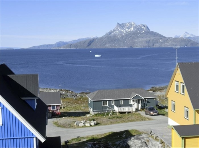 In this image taken on June 20, 2019, Sadelo mountain, also known as Sermitsiaq, can be seen surrounded by Nuup Kangerlua fjord, in Nuuk, Greenland.