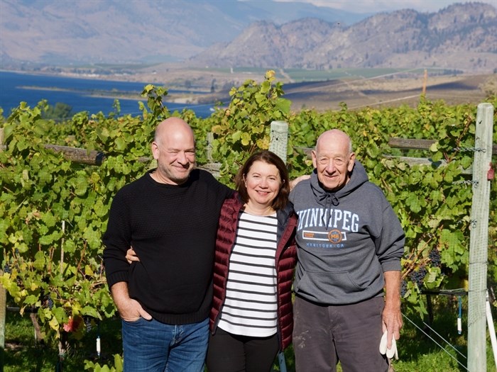 Winners of the Best Small Winery of the Year: Chris & Beata Tolley, of Moon Curser Vineyards shown here on the vineyard high above Osoyoos with Chris' dad Monty (far right)