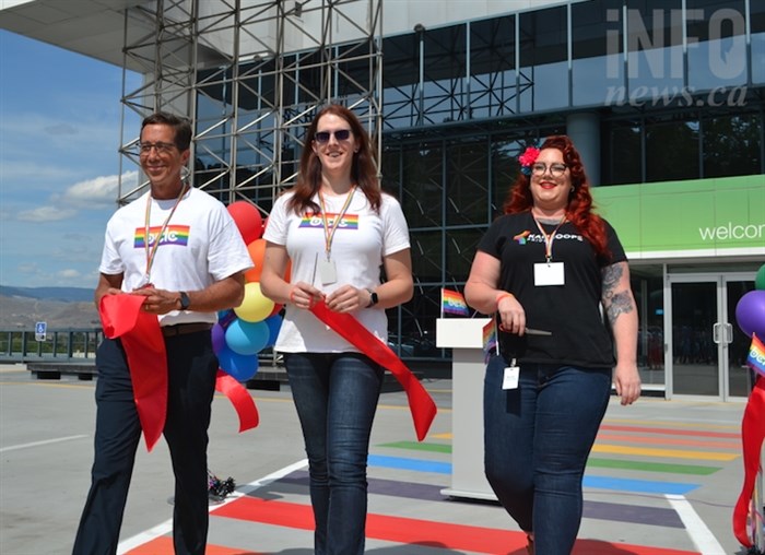 From left to right: Ted Ockenden, Katelyn Boughton, and Nicole Stanchfield cut the ribbon on the rainbow crosswalk in Kamloops, Monday, Aug. 19, 2019.