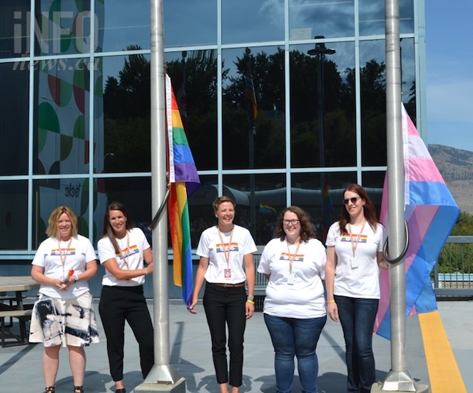 Members of Kamloops Pride raised the well-known rainbow flag, as well as the flag that represents the transgender population.