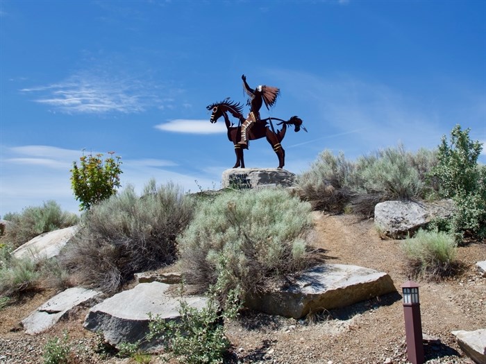 The dramatic warrior at the entrance to Spirit Ridge sets the mood for this magical setting