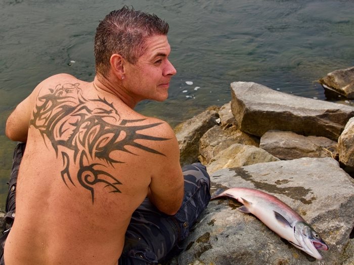 Justin Hall loves to fish for sockeye salmon and forage on the reserve in Oliver-Osoyoos where he grew up. His beautiful tattoo symbolizes the eagle and the bear