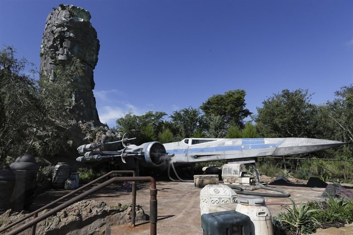 The X-Wing ship stands ready for flight at a display during a preview of the Star Wars themed land, Galaxy's Edge in Hollywood Studios at Disney World, Tuesday, Aug. 27, 2019, in Lake Buena Vista, Fla. The attraction will open Thursday to park guests. 