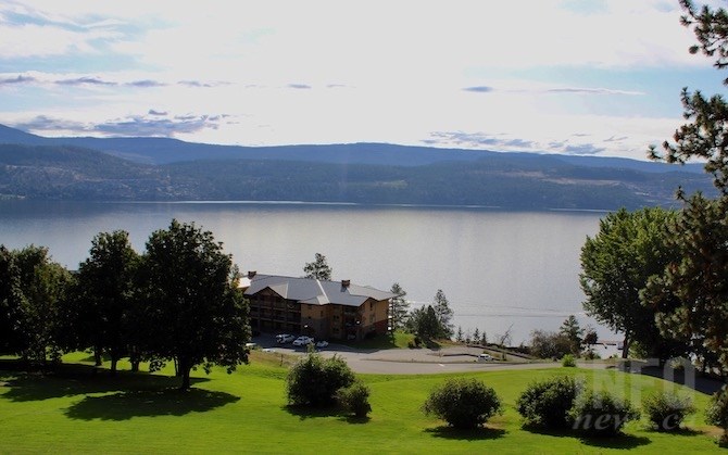 The golf course overlooking one of the newer Point Beach buildings and Okanagan Lake.