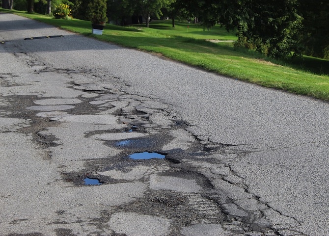 Pot holes are some of the more visible signs of decay.