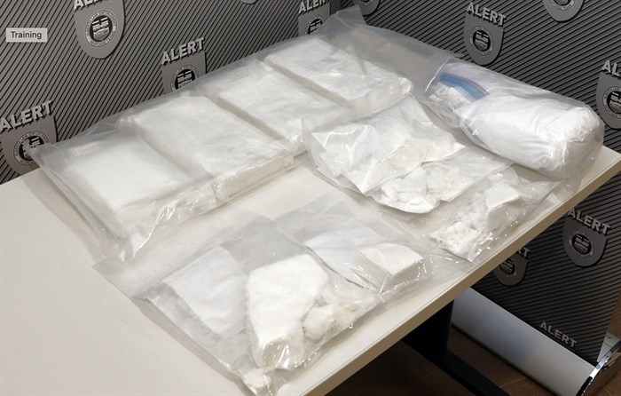 Cocaine, cash, and two vehicles were seized as the result of an ALERT drug trafficking investigation in Edmonton.
