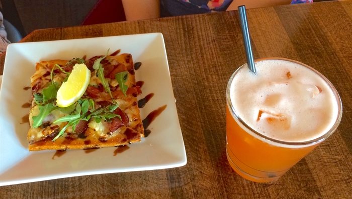 The Train Station pub is a favourite stop for their Okanagan Flatbread and Okanagan Iced Tea