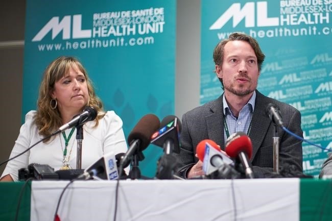 Dr. Chris Mackie, Medical Officer and CEO of Health for the Middlesex-London Health Unit speaks during a press conference in London, Ont., Wednesday, September 18, 2019, as Linda Stobo, manager, Chronic Disease and Tobacco Control at the unit looks on. The announcement involved the first known case in Canada of severe pulmonary illness linked to vaping. 