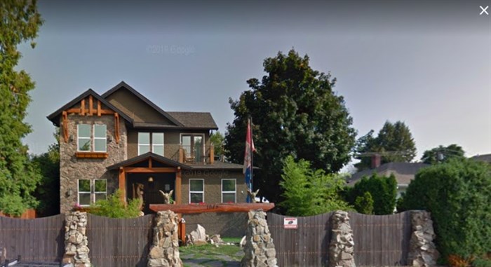 This $1.5 million Kelowna home could be bought for about $27,000 in unpaid taxes, if the owners don't pay up first.