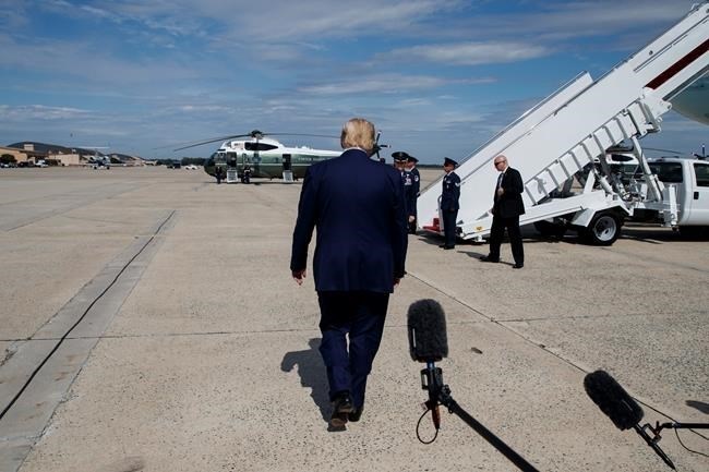 President Donald Trump walks off after speaking with reporters after arriving at Andrews Air Force Base, Thursday, Sept. 26, 2019, in Andrews Air Force Base, Md. Trump had spent the week attending the United Nations General Assembly in New York. 