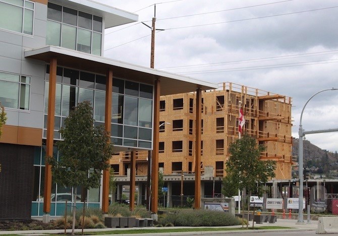 The new RCMP building with the Lodges at Packers Junction rapidly rising behind it.