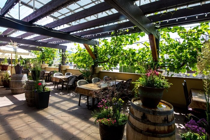 The patio at Villa Rosa creates an amazing Tuscan vibe for diners