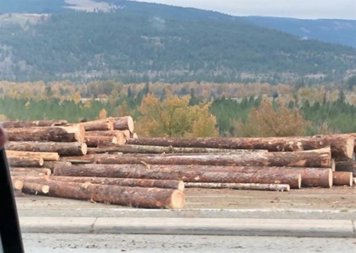 Logs are pictured from an accident scene where a logging truck appears to have partially lost some of its load on Highway 5 near Sun Peaks on Tuesday, Oct. 15, 2019.