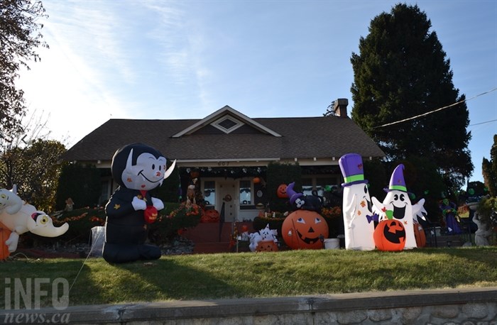 The vampire and the two ghosts are of the brand new inflatable decorations that were left anonymously for the Edwards'.