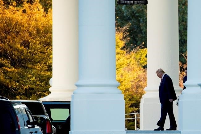 President Donald Trump walks out of the North Portico of the White House in Washington, Monday, Oct. 28, 2019, to travel to Andrews Air Force Base, Md., and then on to Chicago. 