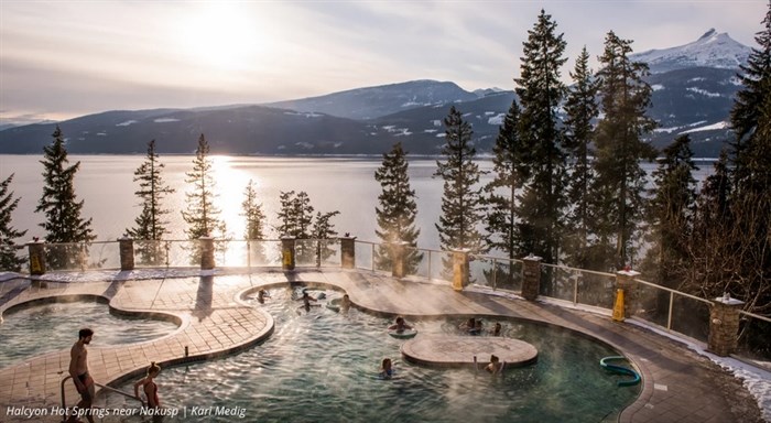 The outdoor pool at Ainsworth Hot Springs offers spectacular views of Kootenay Lake.