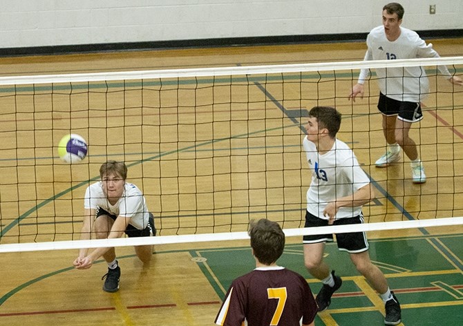 Vernon Christian School Royals' Levi VanderDeen goes low to save the rally against King's Christian School in Single-A level volleyball action in Lumby Saturday, Nov. 9. The Royals earned a provincials berth and will go to Castlegar Nov. 21.