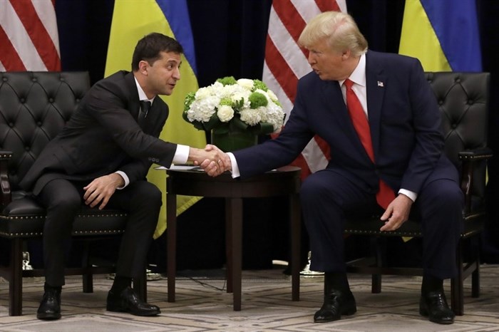 FILE - In this Sept. 25, 2019, file photo, President Donald Trump meets with Ukrainian President Volodymyr Zelenskiy at the InterContinental Barclay New York hotel during the United Nations General Assembly in New York. 