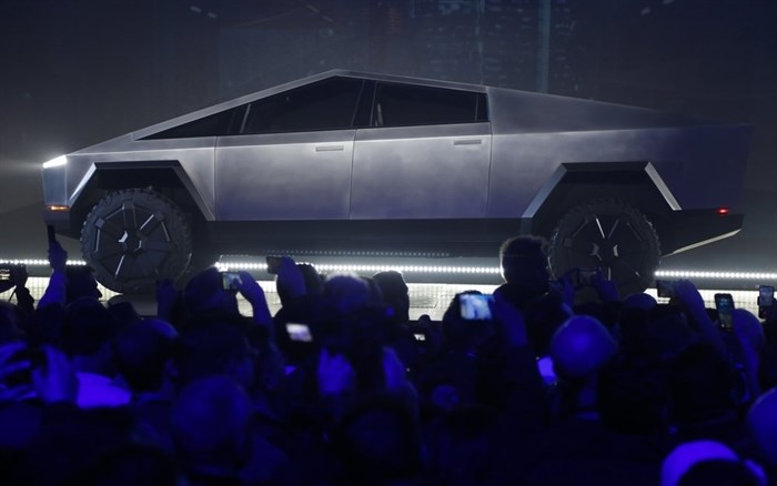The Tesla Cybertruck is unveiled at Tesla's design studio on Thursday, Nov. 21, 2019, in Hawthorne, Calif. CEO Elon Musk is taking on the workhorse heavy pickup truck market with his latest electric vehicle.