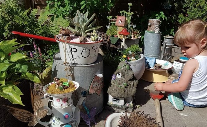 Clare started the fairy garden for her granddaughters. Now, children from all over the neighbourhood come to play in it.