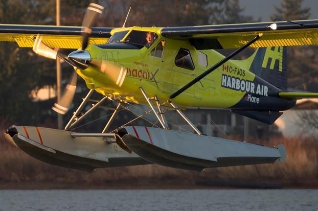 The world's first electric commercial aircraft owned and operated by Harbour Air is seen landing following its maiden flight in Richmond, B.C., Tuesday, December 10, 2019.