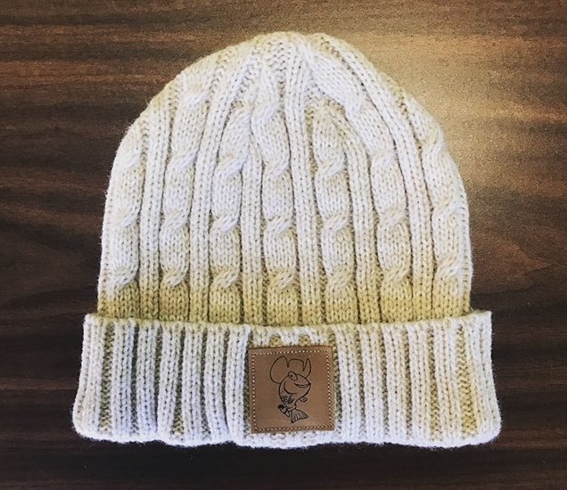 One of the three versions of Kami the Fish toques on sale for a limited time only.