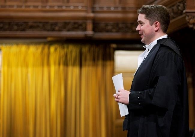Speaker of the House of Commons Andrew Scheer rises at the end of Question Period in the House of Commons in Ottawa, Thursday, December 15, 2011. 