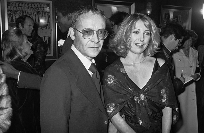 FILE - In this Nov. 15, 1977, file photo, Buck Henry and Teri Garr appear at the opening of the movie 