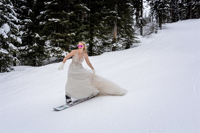 Alysa Attema boarded down the slopes in Sun Peaks for her wedding photos on Saturday, Feb. 15, 2020.