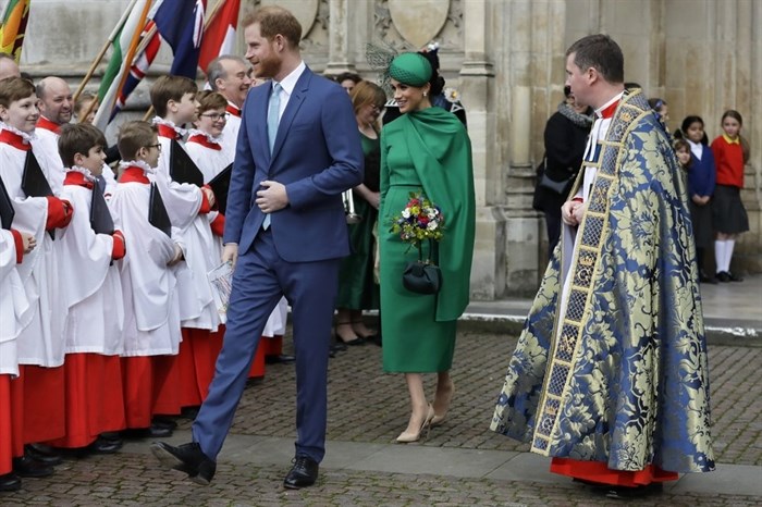 Britain's Harry and Meghan the Duke and Duchess of Sussex leave after attending the annual Commonwealth Day service at Westminster Abbey in London, Monday, March 9, 2020. The annual service, organised by the Royal Commonwealth Society, is the largest annual inter-faith gathering in the United Kingdom. 