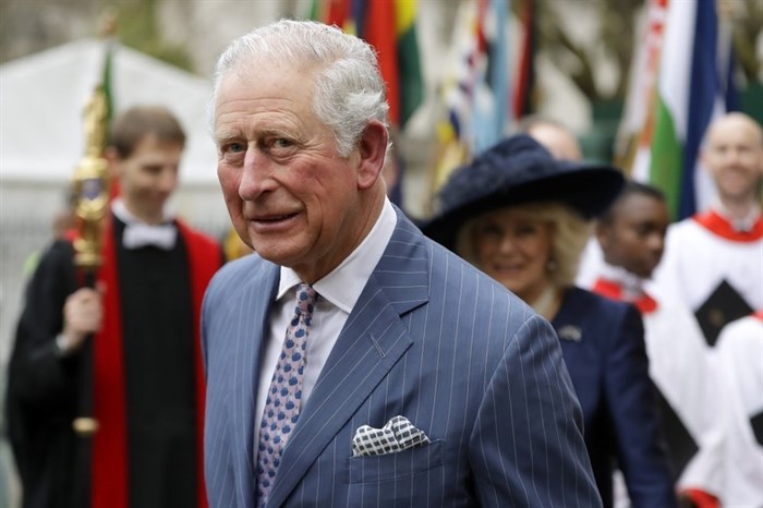 Britain's Prince Charles and Camilla the Duchess of Cornwall, in the background, leave after attending the annual Commonwealth Day service at Westminster Abbey in London, Monday, March 9, 2020. The annual service, organised by the Royal Commonwealth Society, is the largest annual inter-faith gathering in the United Kingdom.