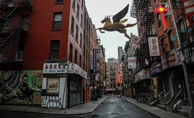 A street in New York's Chinatown is empty, the result of citywide restrictions calling for people to stay indoors and maintain social distancing in an effort to curb the spread of COVID-19, Saturday March 28, 2020, in New York. President Donald Trump says he is considering a quarantine affecting residents of the state and neighboring New Jersey and Connecticut amid the coronavirus outbreak, butÂ New York Gov. Andrew Cuomo said that roping off states would amount to 