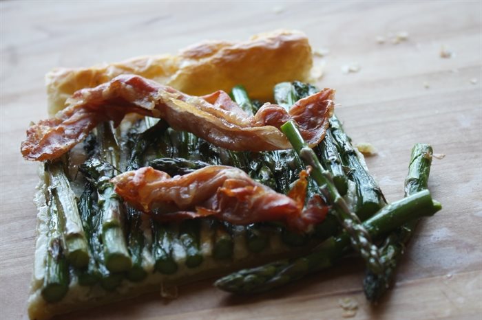 Gruyere cheese and salty prosciutto take this asparagus tart to the next level.